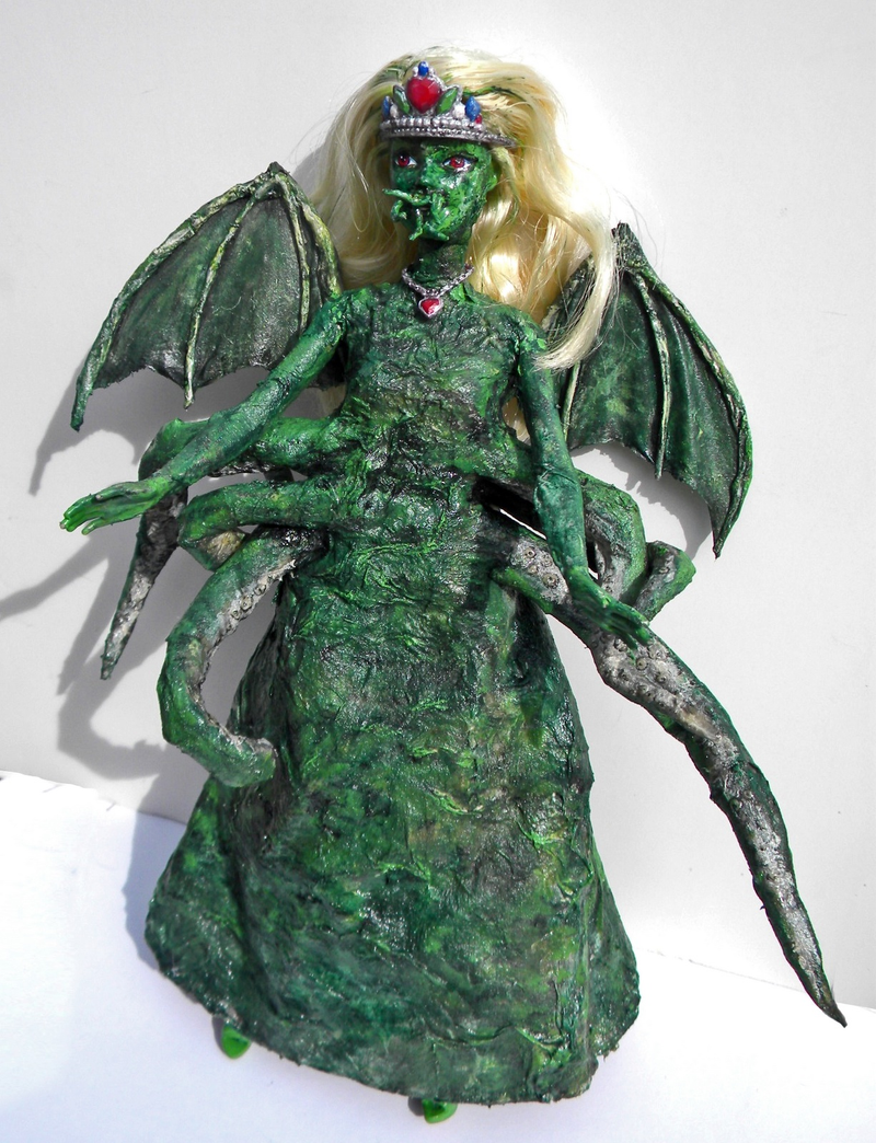 Illustration for article titled In her dream house at R'lyeh, dead Cthulhu Barbie waits dreaming